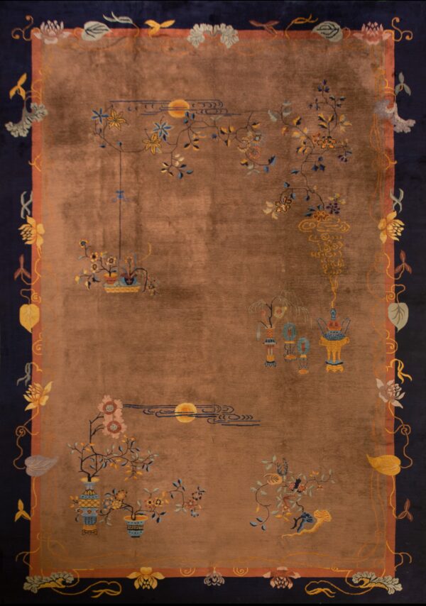 Brown rug with high sheen, dark blue border, and sparse, multi-colored floral and lantern motifs.