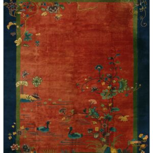 Rust red rug featuring two ducks swimming among floral vines within a dark blue and green border.