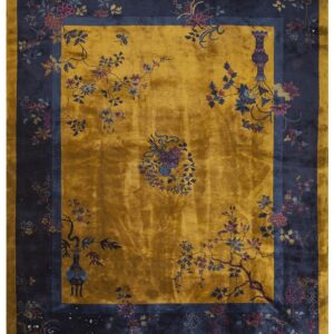 Rich gold, high-sheen rug with a wide navy border featuring colorful ornate floral patterns.