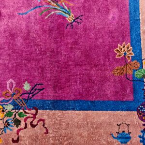 Bright magenta field bordered by pink and blue stripes, featuring stylized floral, vase, and teapot motifs.