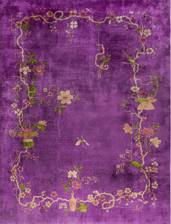 Vibrant purple rug featuring a classical botanical border design with detailed flowers, vines, and birds.