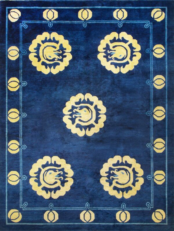 Deep royal blue rug featuring five stylized yellow medallions and a light blue ornamental border.