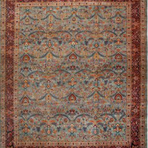 Square rug with a blue-green field and dense, colorful traditional floral patterns and multi-layered red borders.