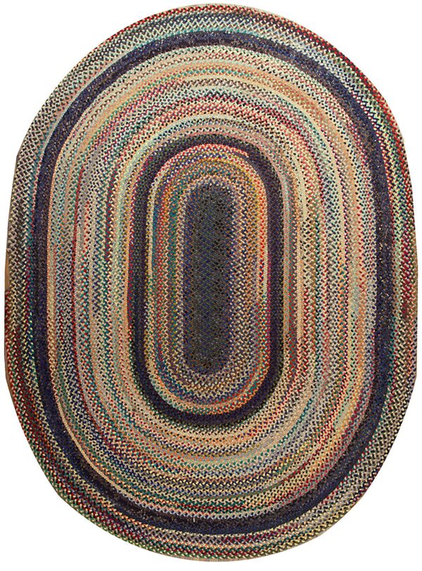 Oval braided rug featuring concentric rings of multicolored stripes and a dark blue center.