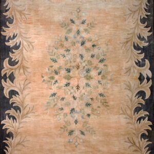 Peach field rug with dark borders and light scrolling botanical leaves surrounding a delicate floral cluster.