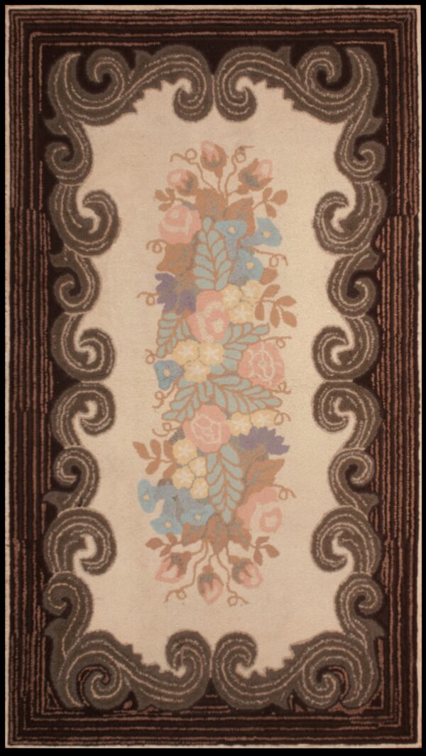 Muted pastel floral spray on a cream field surrounded by an elaborate dark brown scroll border.