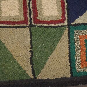 Concentric geometric pattern in a high, bumpy texture featuring beige, red, green, blue, and orange sections.