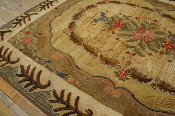 Close-up of a textured rug in tan and brown with a rustic floral bouquet on wood planks.