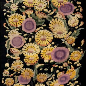 Black rug with a dense floral pattern of yellow, gold, and purple blossoms and green leaves.