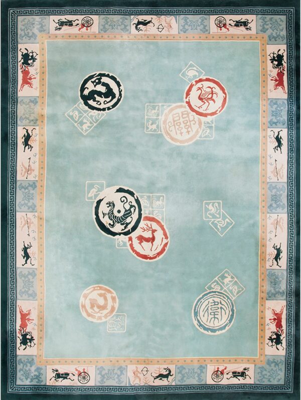 Light teal rug with a multi-layered border and scattered circular motifs of animals and symbols.