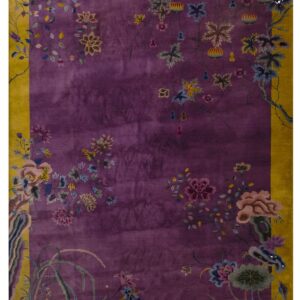 Rectangular rug with a purple field, golden border, and multicolored floral and vine motifs.