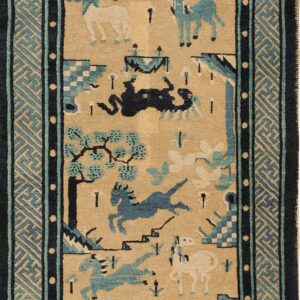 Tan rug with a field of stylized animals bordered by intricate geometric teal and dark blue fretwork.