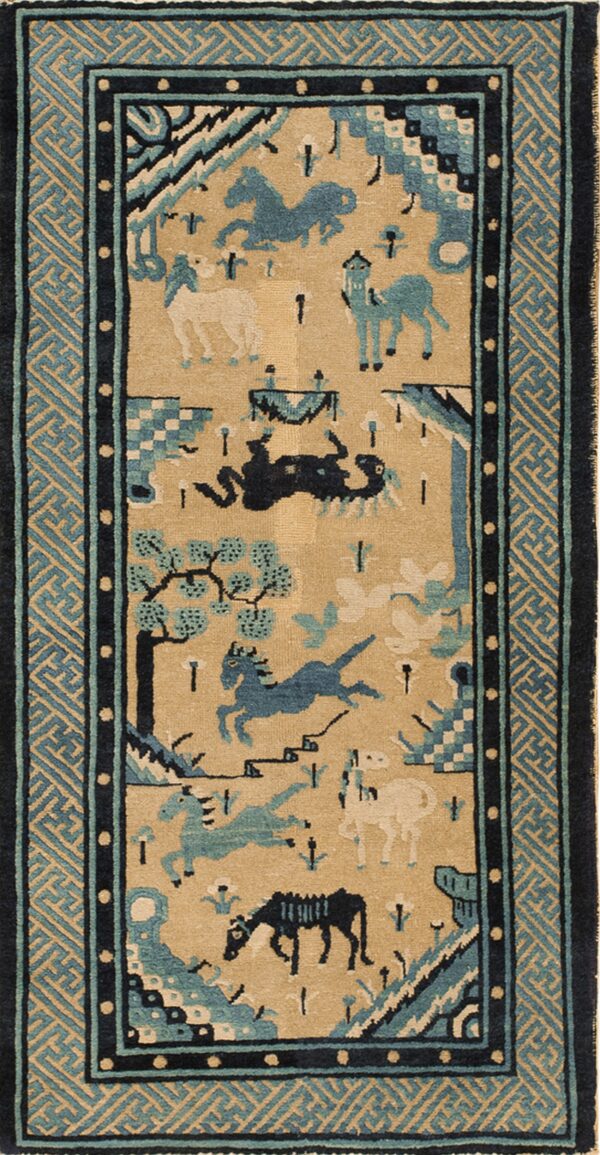 Tan rug with a field of stylized animals bordered by intricate geometric teal and dark blue fretwork.