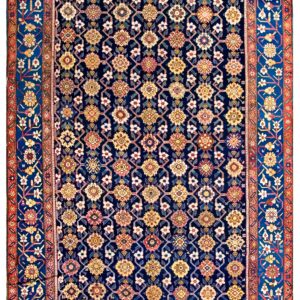 Navy blue runner rug featuring a repeating floral lattice pattern and multiple borders in red and royal blue.