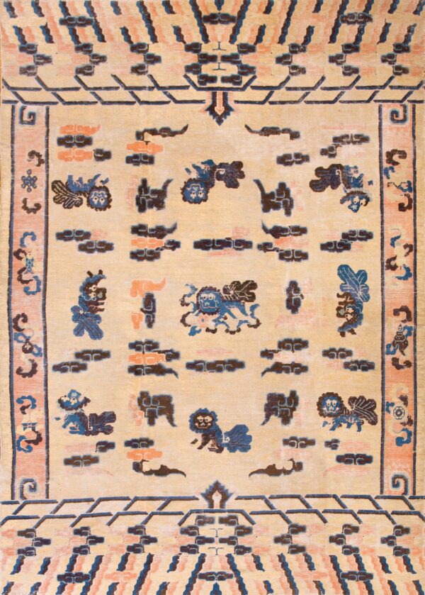 Beige rug with low pile features blue and brown stylized animal motifs and stepped geometric borders.