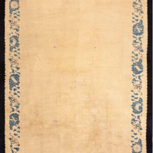 Beige low-pile rug featuring subtle geometric patterning and a thick border of blue floral and cloud designs.