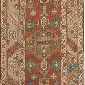 Geometric runner rug with a rust central field, tan borders, and accents of blue and brown.