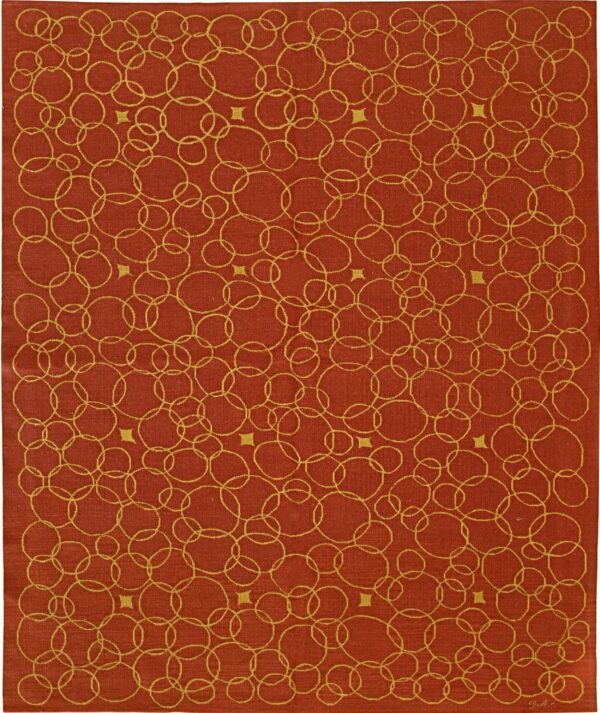 An orange and yellow rug with a flat texture and repeating pattern of large, overlapping circles.