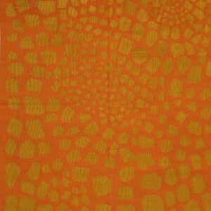 Vibrant orange rug with an abstract design of irregular gold shapes radiating from the center.