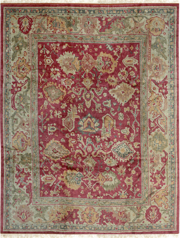 Deep red traditional pile rug featuring botanical motifs in sage, gold, and taupe borders.