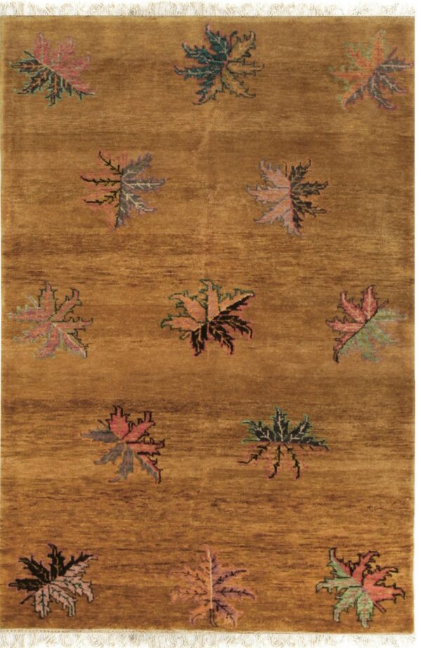 Ochre rug with subtle horizontal abrash and large multicolored, stylized scattered leaf motifs.