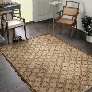 Light beige rug with a brown geometric scroll pattern sits between two wooden armchairs on dark wood flooring.