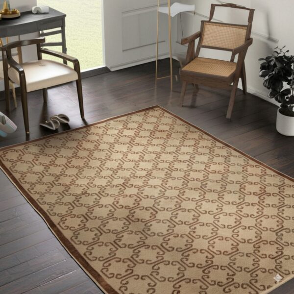 Light beige rug with a brown geometric scroll pattern sits between two wooden armchairs on dark wood flooring.