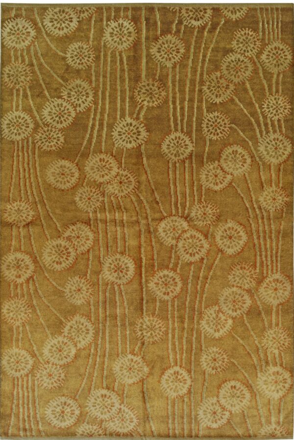 Gold and tan rug with a carved botanical pattern of repeating starburst flowers and vertical stems.