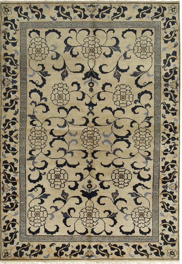Beige rug with black and gray scrolling floral pattern and a geometric greek key border.