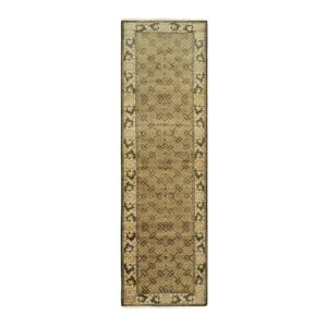 Muted brown and beige runner rug featuring a geometric lattice field and dark scrolling border motifs.