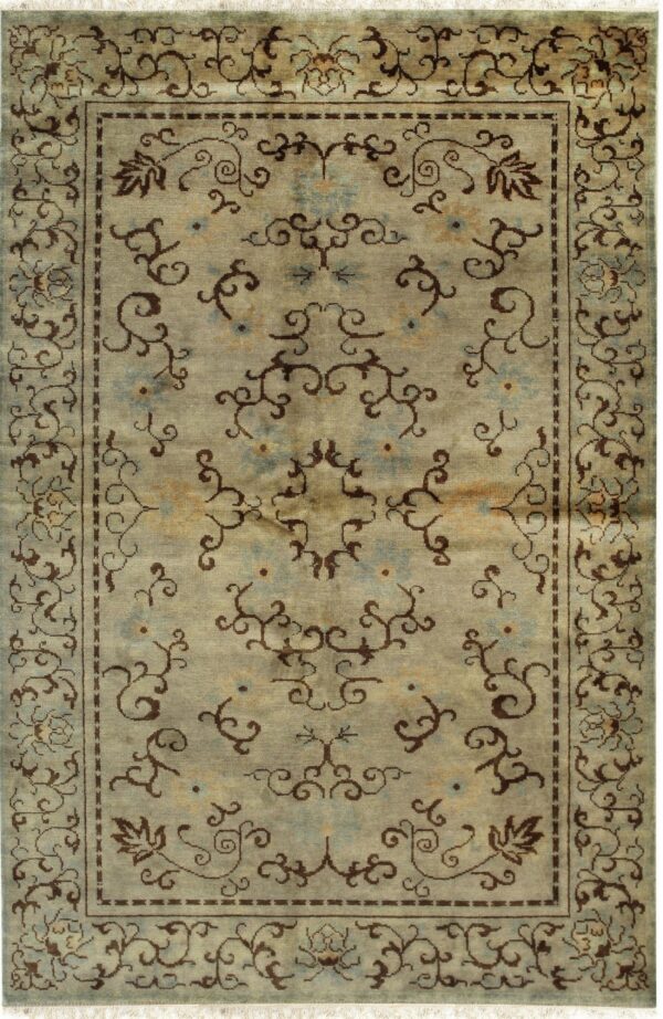 Sage green rug with dark brown scrolling vines and blue floral accents, bordered on all sides.