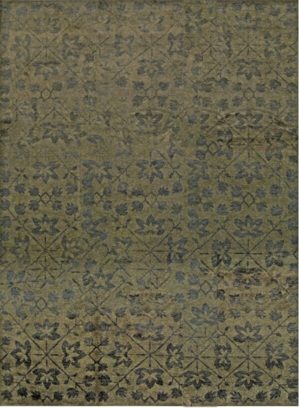 A distressed olive green rug featuring a faded charcoal trellis and stylized floral medallion pattern.