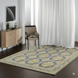 Gray and gold repeating patterned area rug anchors a room with sheer curtains and dark floors.