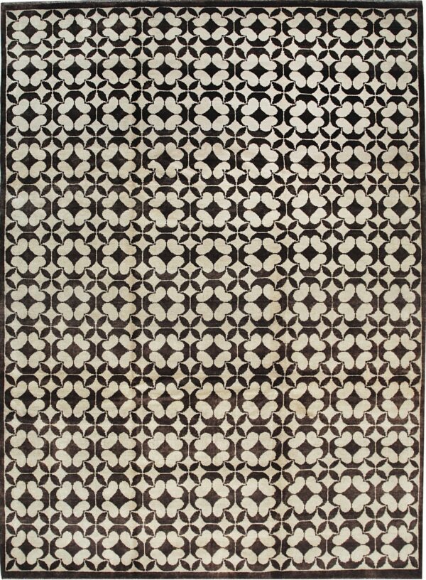 Dark brown and light beige rug with a repeating geometric quatrefoil pattern.