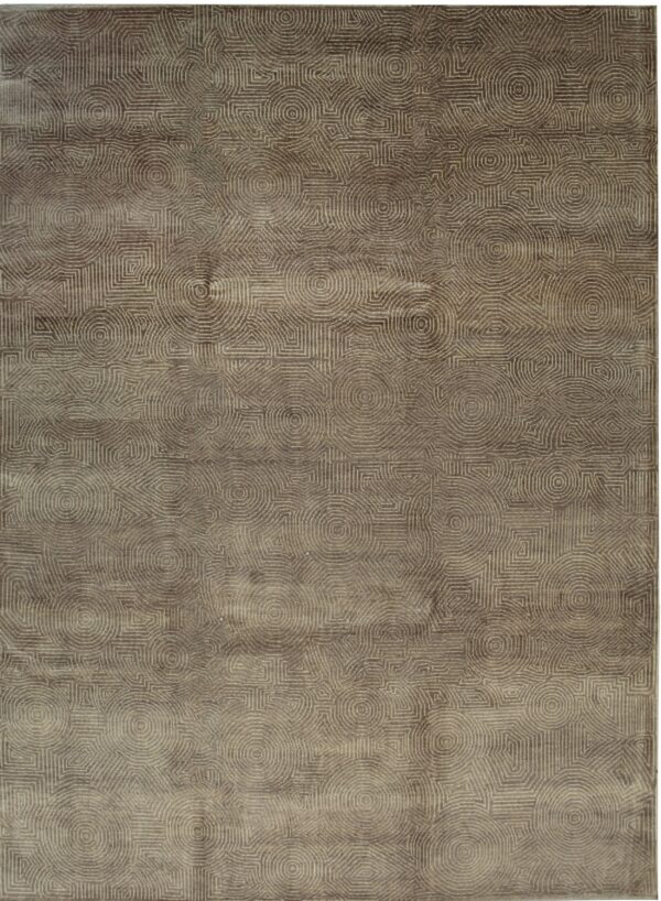 A tonal brown-taupe area rug displays an intricate geometric pattern of concentric circles and squares.