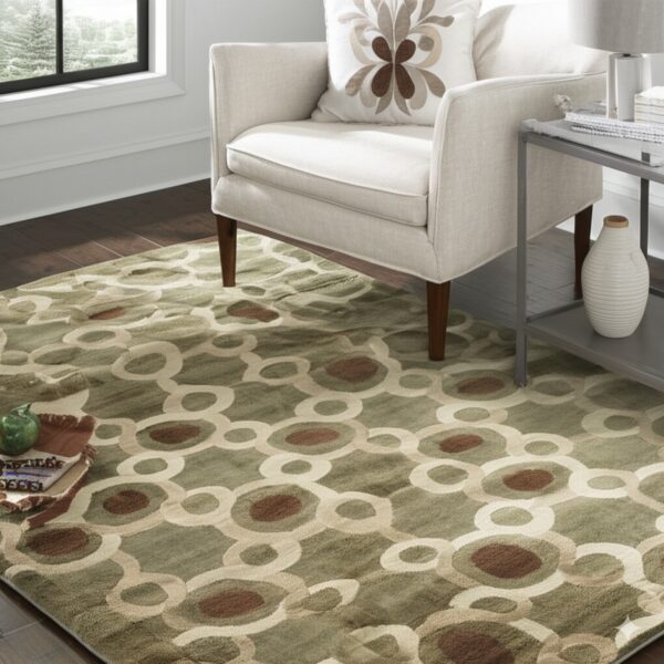 A green, brown, and beige interlocking circle rug sits beneath a neutral armchair and side table.
