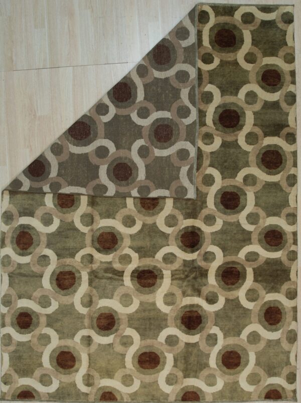 Modern olive rug featuring brown, tan, and cream interlocking geometric circles on a light wood floor.