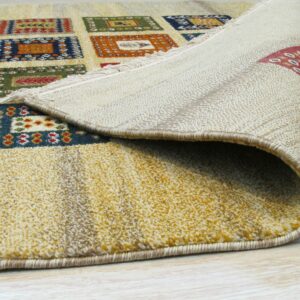 A medium-pile rug in yellow, blue, orange, and green geometric squares is rolled up on light flooring.