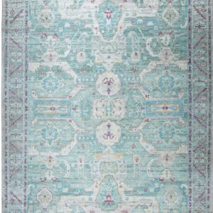 Distressed teal and cream area rug featuring a traditional medallion pattern and short fringe.