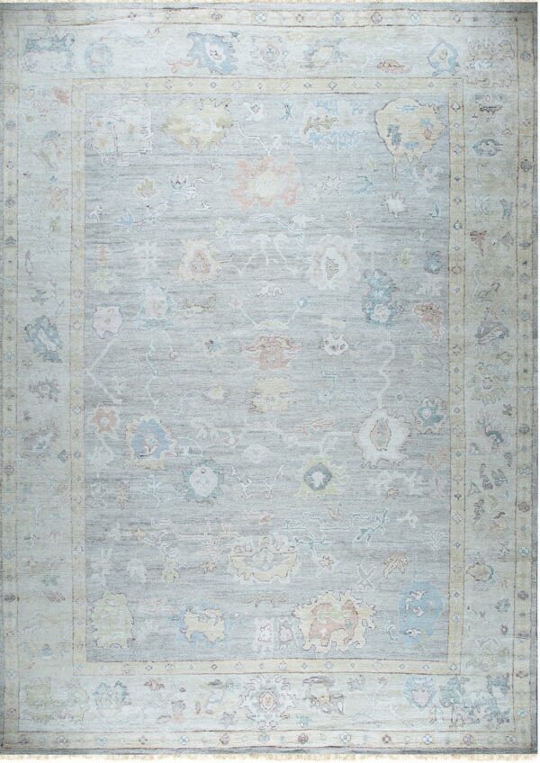 Light gray rug with a washed-out traditional pattern border and pastel blue, yellow, and coral designs.