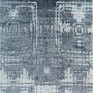 Abstract rug pattern in deep blue and pale gray featuring distressed geometric and architectural motifs.