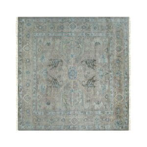 Low-pile gray and blue traditional square rug with short fringe displayed against a white background.