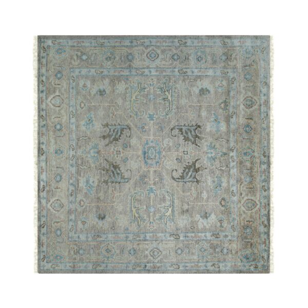Low-pile gray and blue traditional square rug with short fringe displayed against a white background.