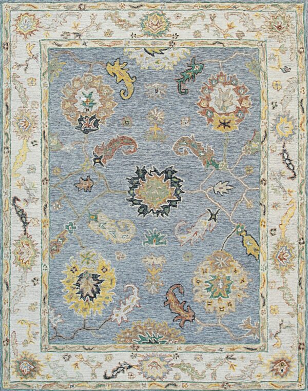 Textured blue rug with an ivory border and traditional floral designs in yellow, rust, and green.