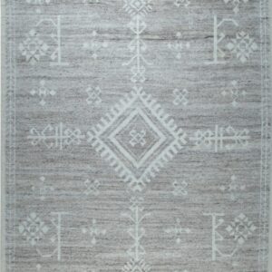 Gray rug with an overall striated texture and white geometric and tribal designs.