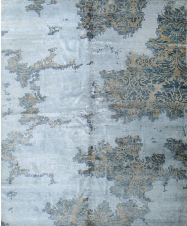 Light blue rug featuring an abstract, eroded damask pattern in shades of teal and beige.