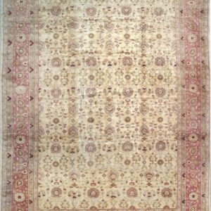 Pale ivory rug featuring an all-over floral pattern and wide rose borders with visible sheen.