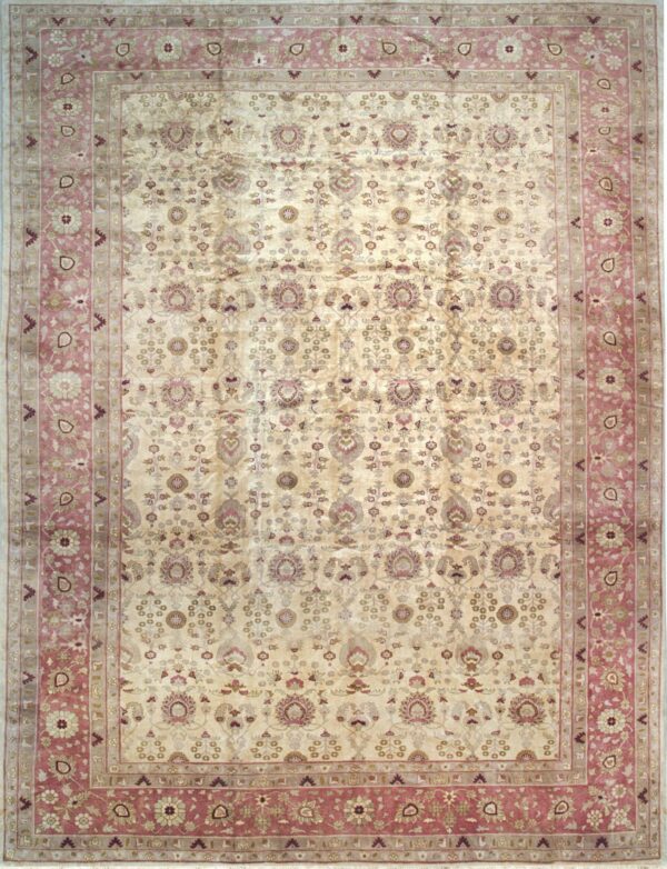 Pale ivory rug featuring an all-over floral pattern and wide rose borders with visible sheen.