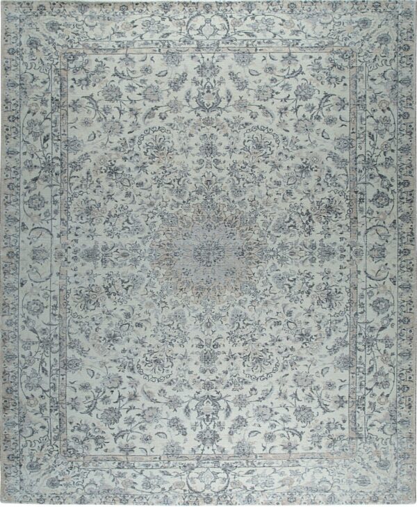 Traditional rug with a charcoal floral pattern against a faded cream and pale gray background.