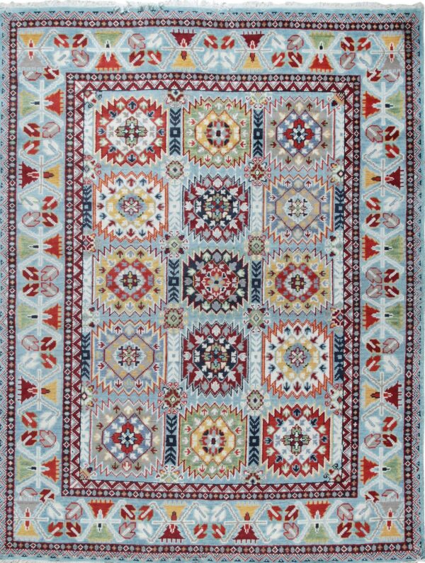 Light blue rug with a grid of twelve multicolored geometric medallions and complex, detailed borders.